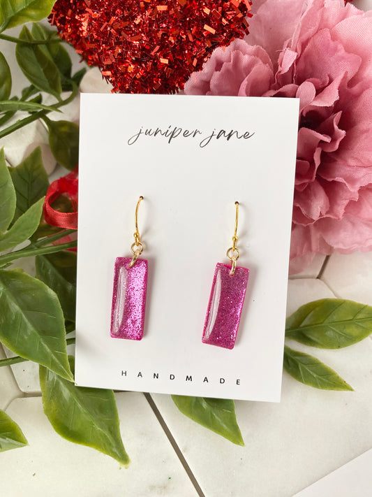 XO | High Gloss Magenta Glittery Bar Dangles